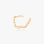 This is an image of a gold-toned, square-shaped huggie with pave CZ stones. color:null|gold/clear