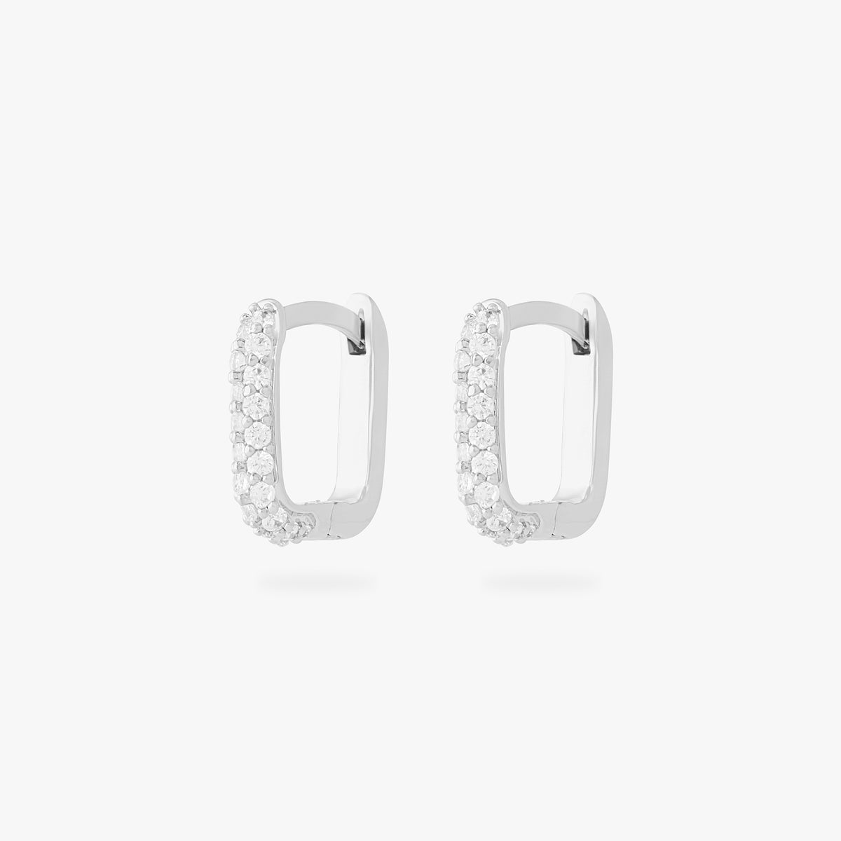 This is an image of a pair of silver-toned, square-shaped huggies with pave CZ stones. [pair] color:null|silver/clear