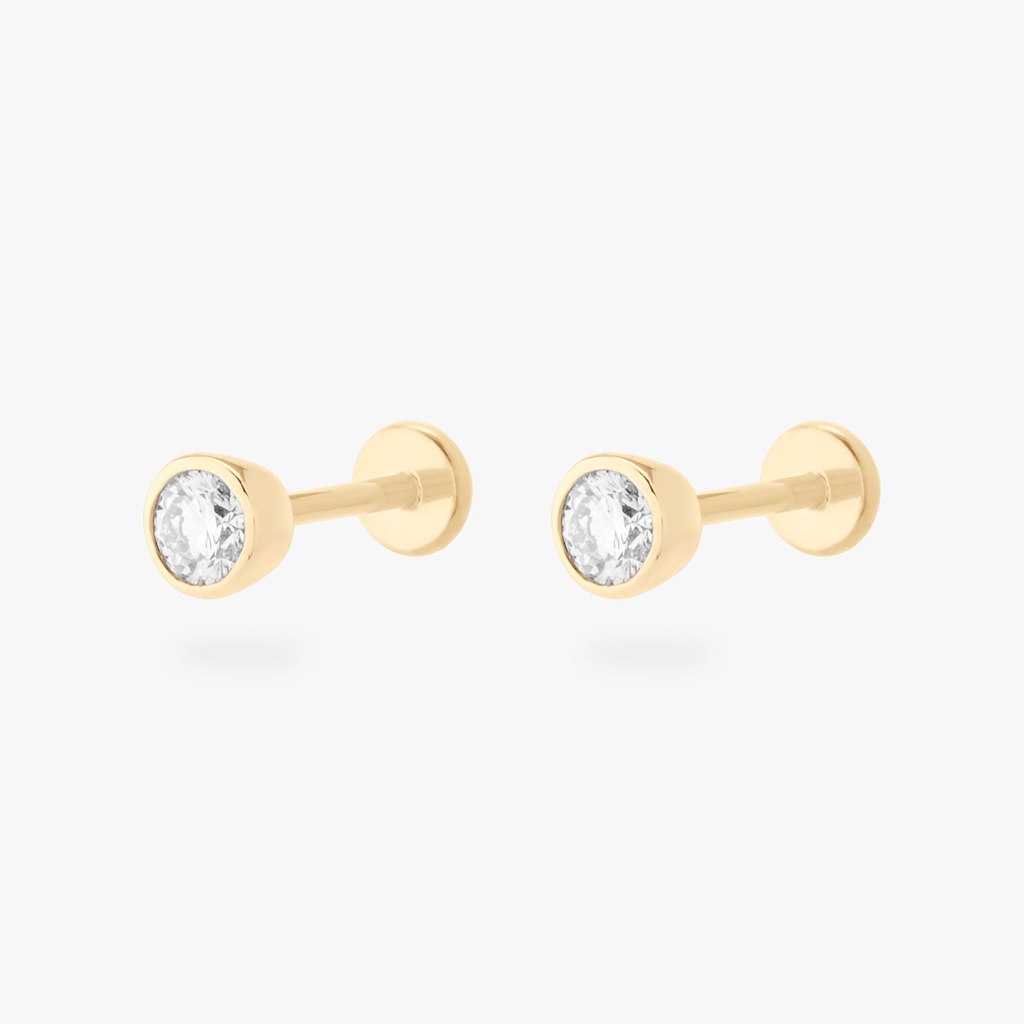 bezel lab grown diamond set in 14k yellow gold [pair] color:null|yellow gold/clear