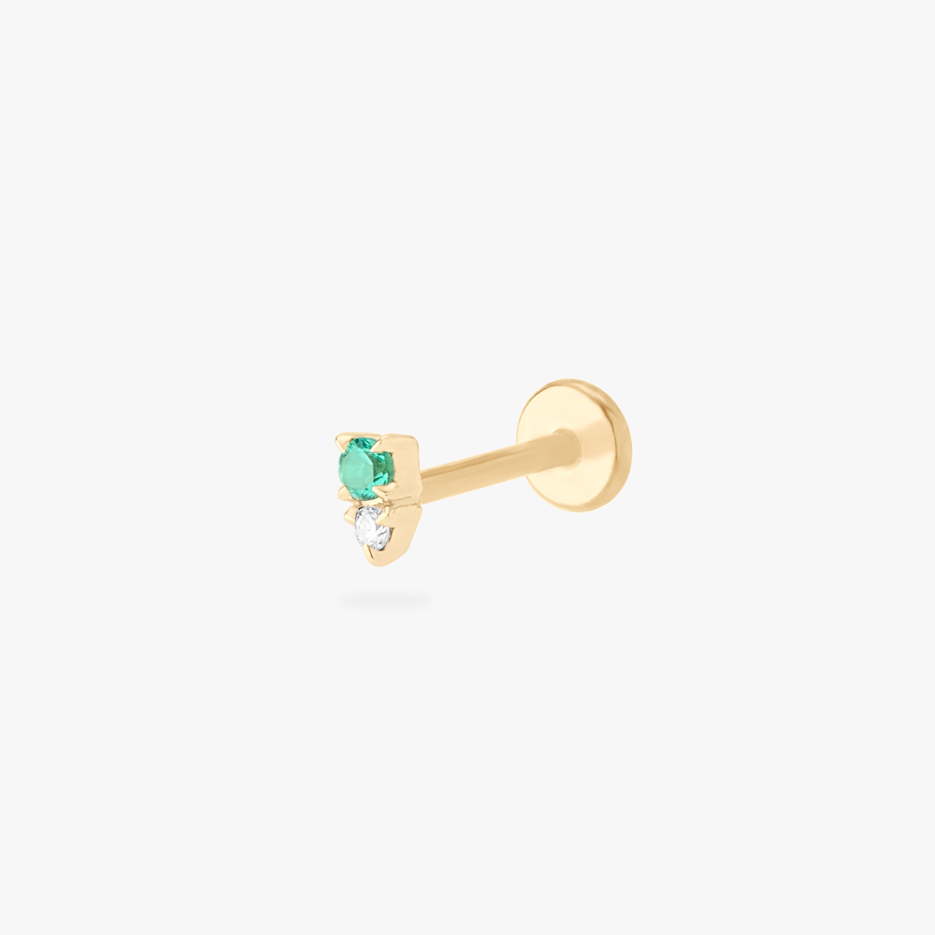This is an image of a gold flatback stud with a green stacked cz stone. - Main view