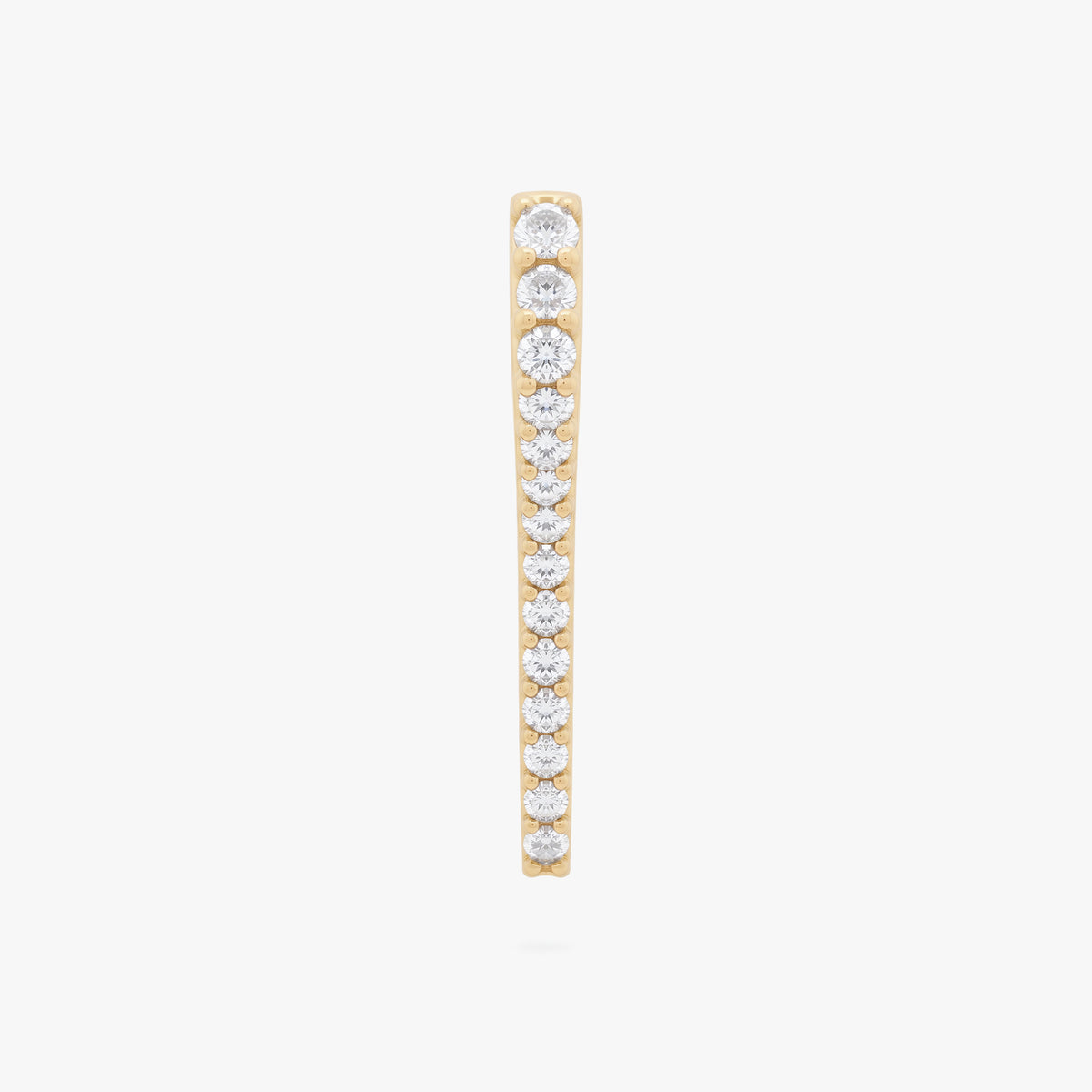 This image shows the front view of the 14k gold plated long pave spike huggie with cz clear stones down the front 