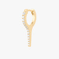 This image shows the side view of the 14k gold plated long pave spike huggie with cz clear stones down the front 