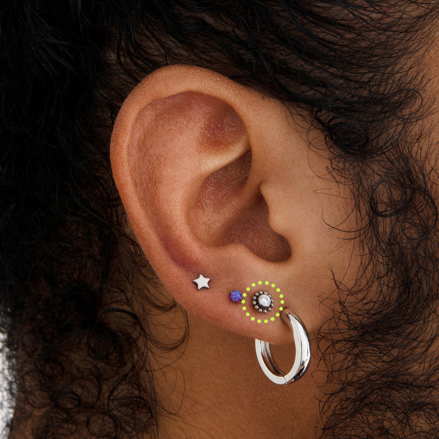 on ear featuring a titanium beaded cz flatback stud [hover] color:null|titanium/clear