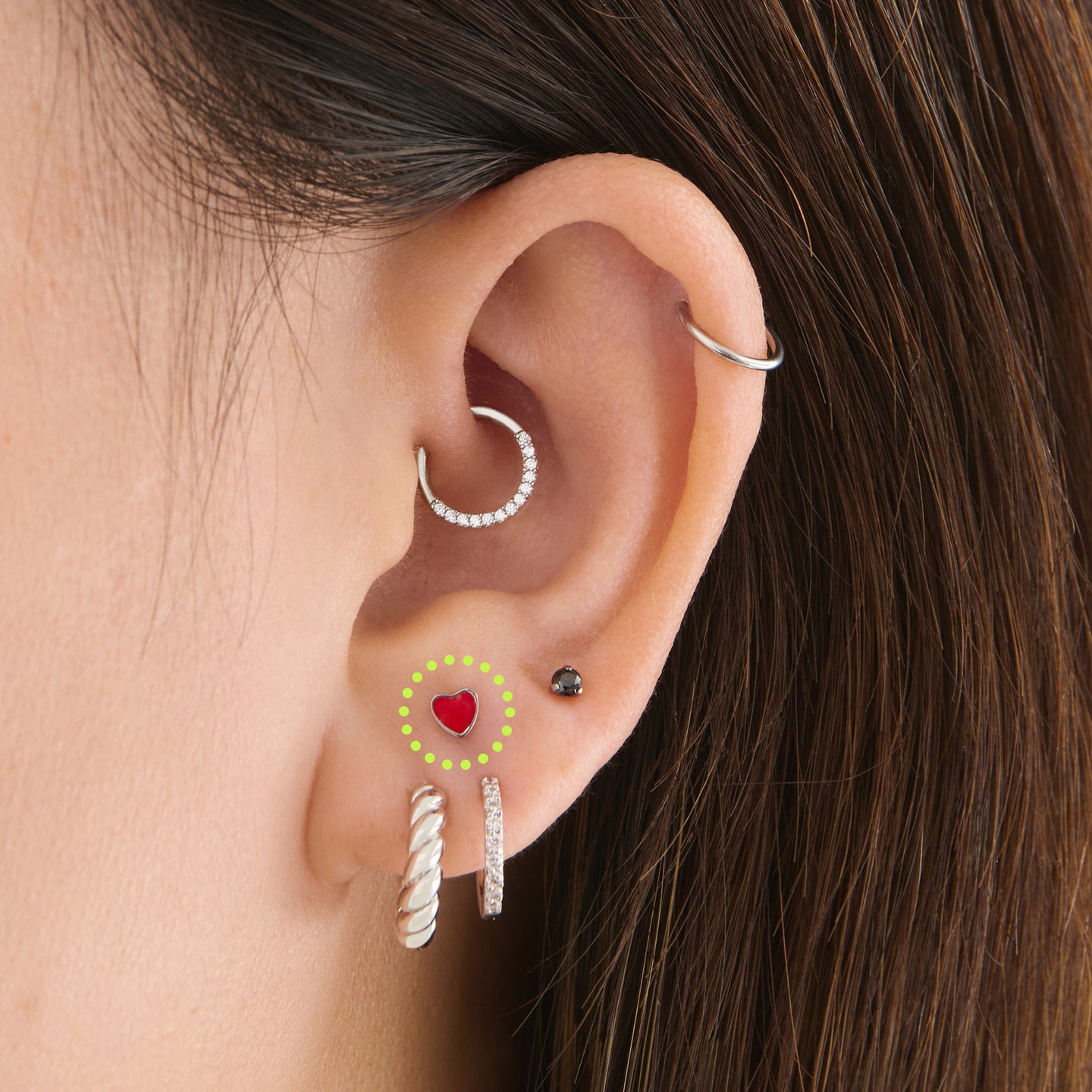 on ear featuring a titanium red enamel heart flatback stud [hover] color:null|titanium/red