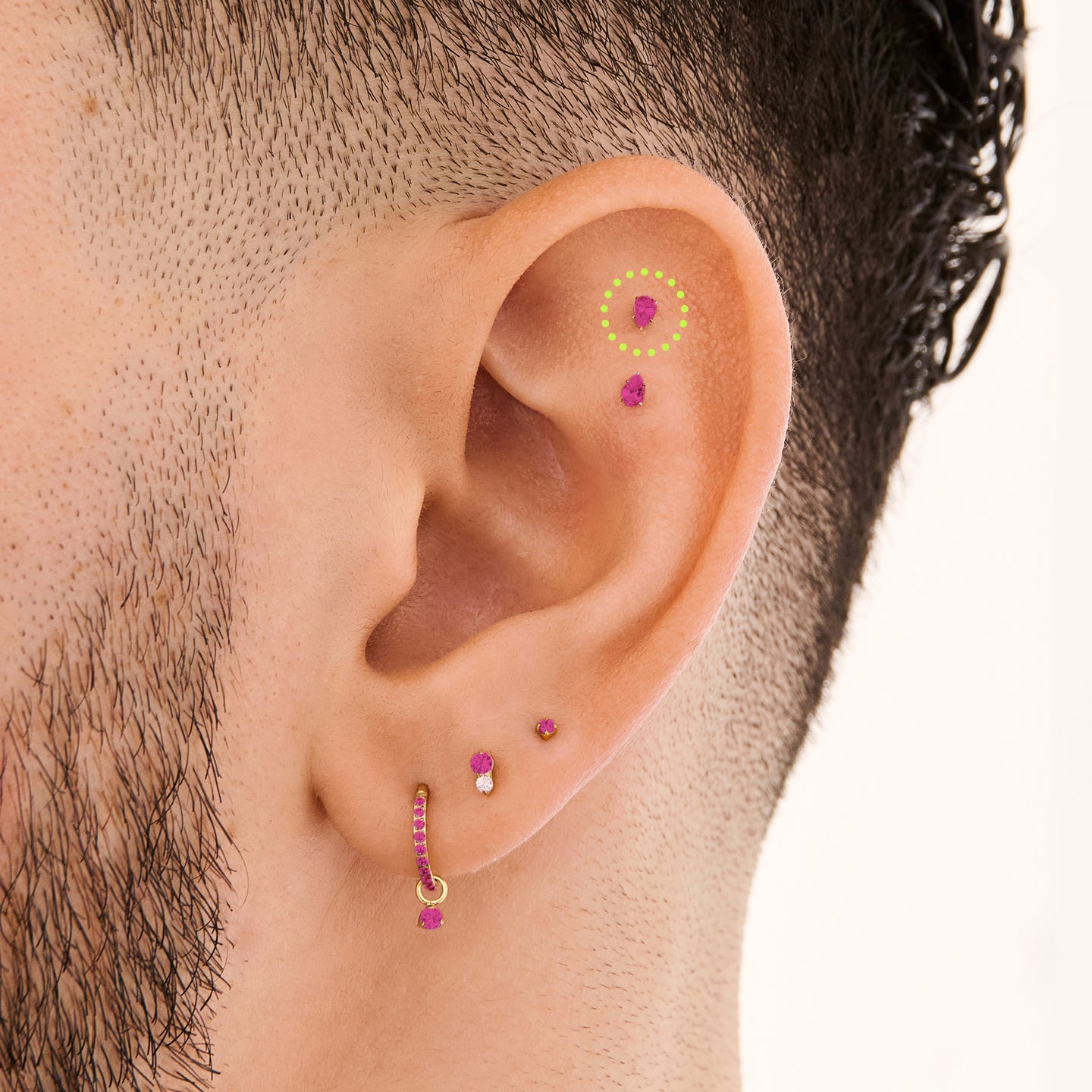 This is a 14K gold flatback stud with a pear shaped ruby cz stone on ear. [hover] color:null|ruby