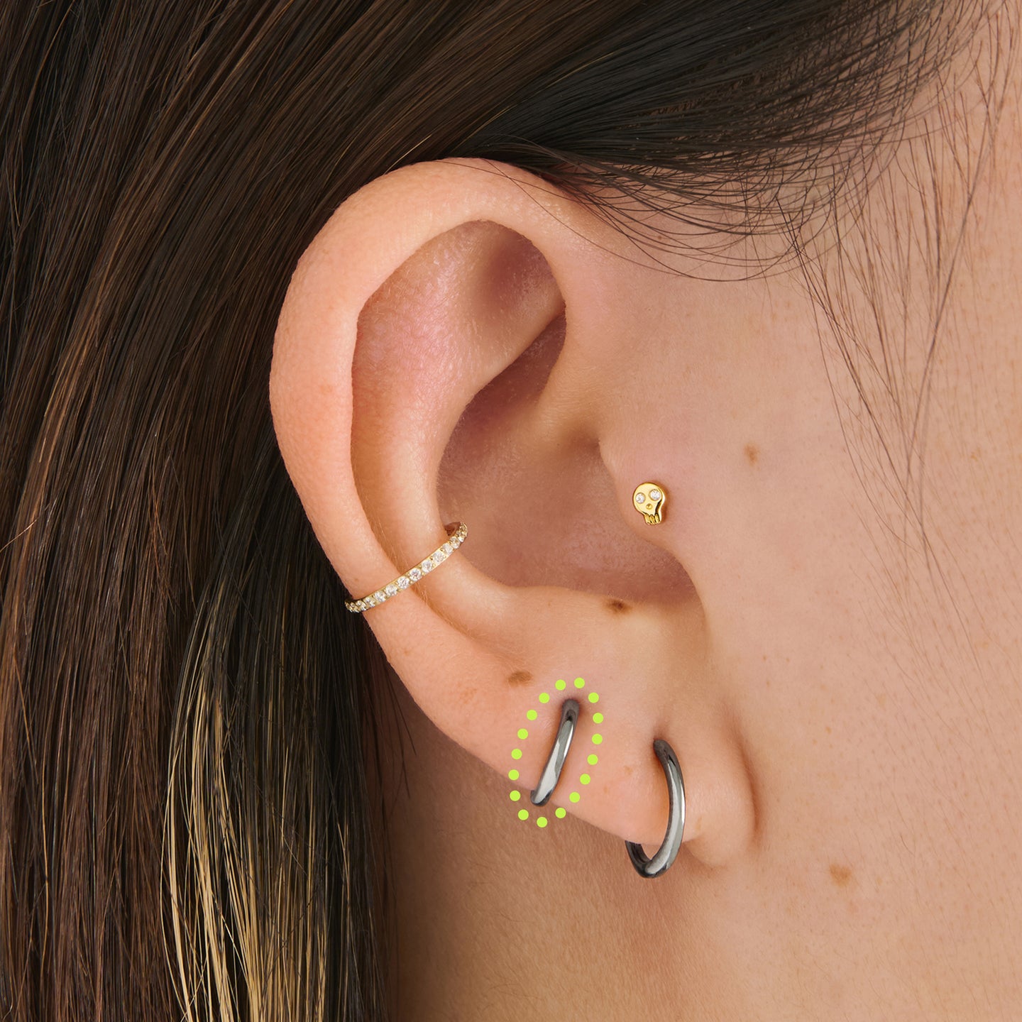 on ear featuring a micro slim huggie in gunmetal [hover] color:null|gunmetal