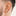 This is an image of a silver-toned, square shaped huggie that has twists throughout it on ear. [hover] color:null|silver