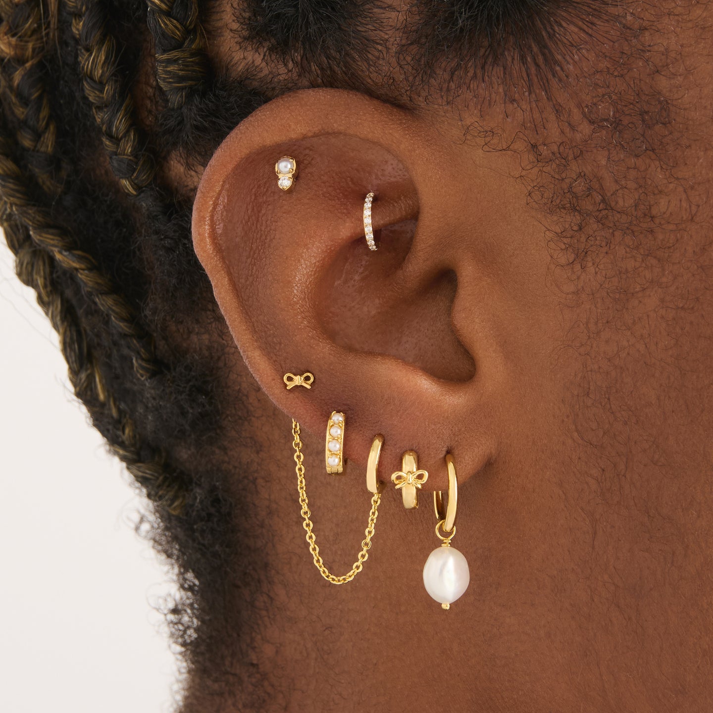 on ear featuring micro slim huggie with a 30mm chain with an open jump ring [hover] color:null|gold