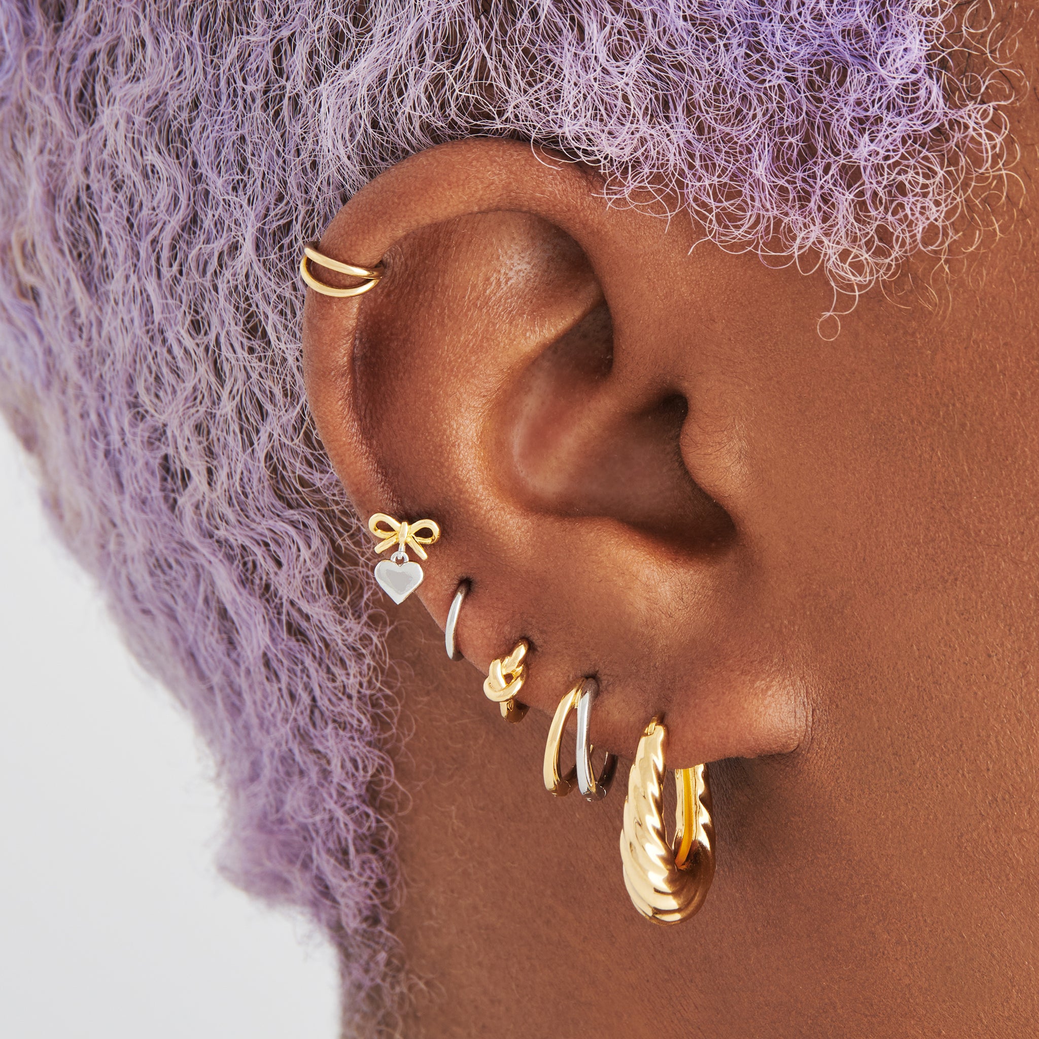 Two ear piercings on sale earrings