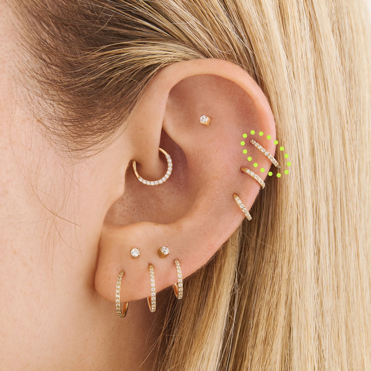 on ear featuring an 8mm seamless pave clicker in gold [hover] color:null|gold