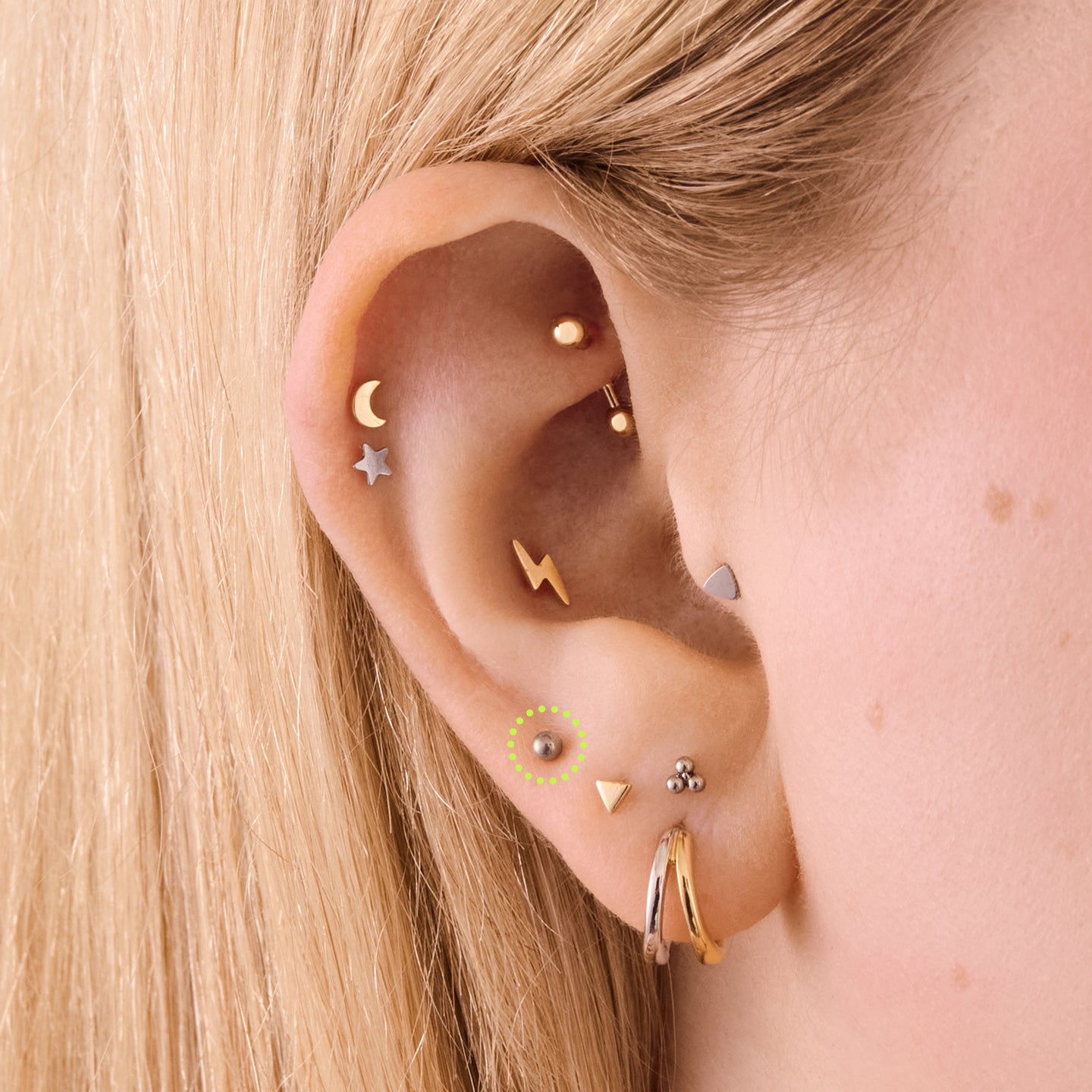 on ear featuring a titanium 2.5mm ball flatback stud [hover] color:null|titanium