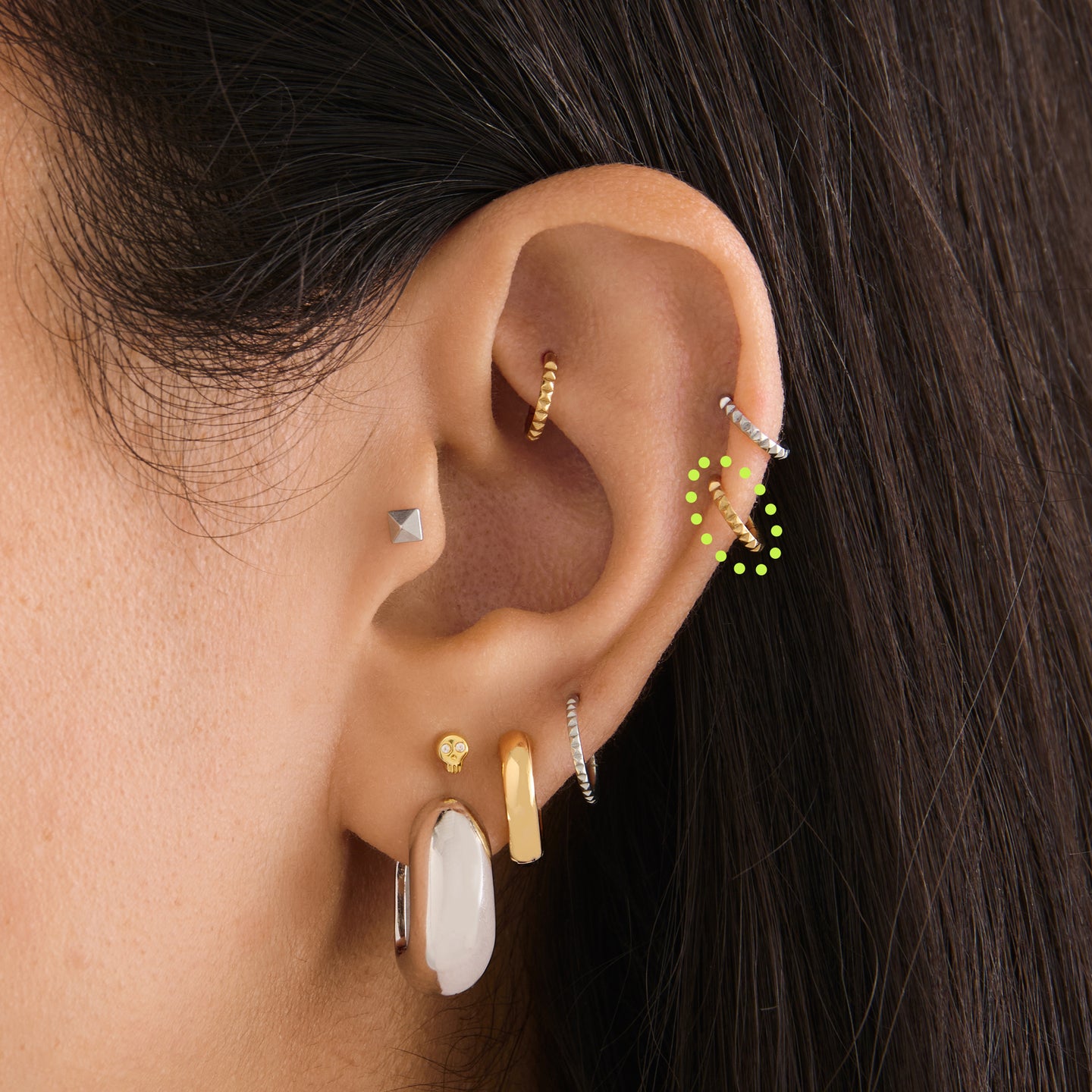 on ear featuring a 6mm pyramid clicker in gold [hover] color:null|gold