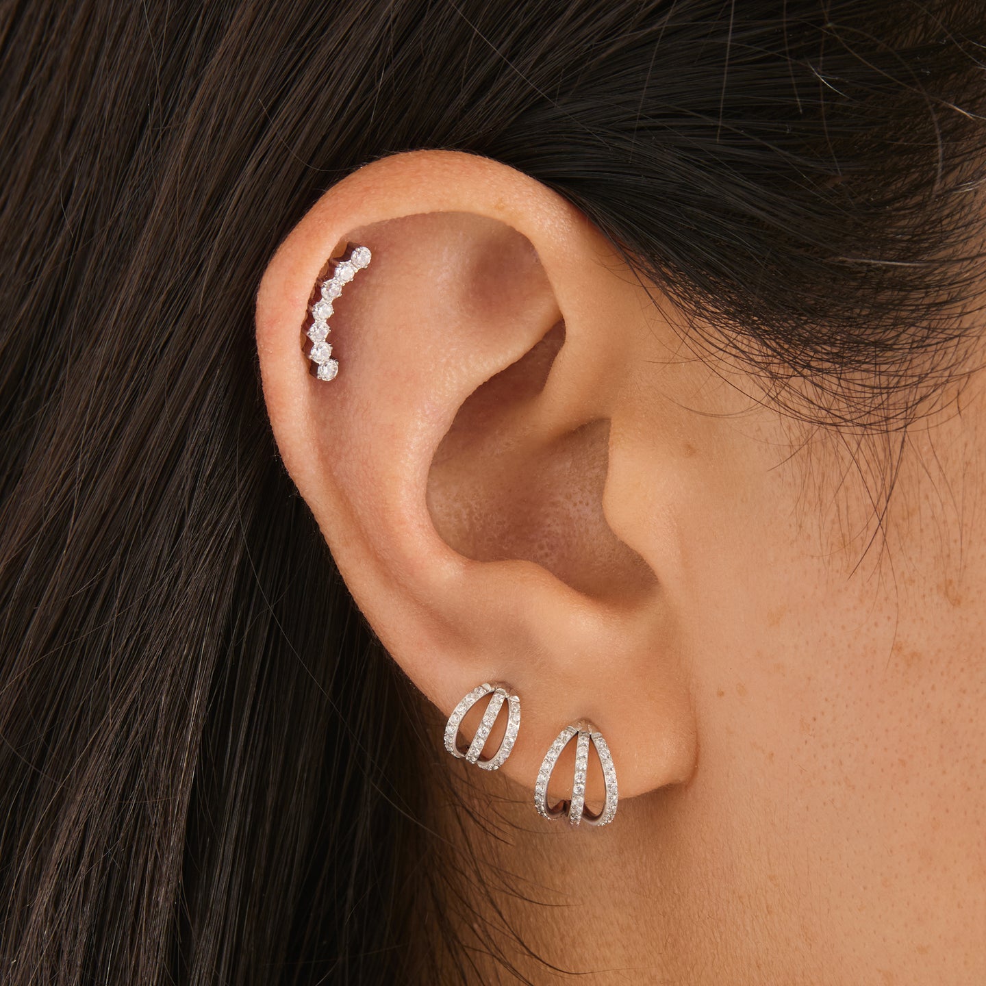 set featuring triple pave clickers and a curved cz flatback stud [hover] color:null|silver/clear