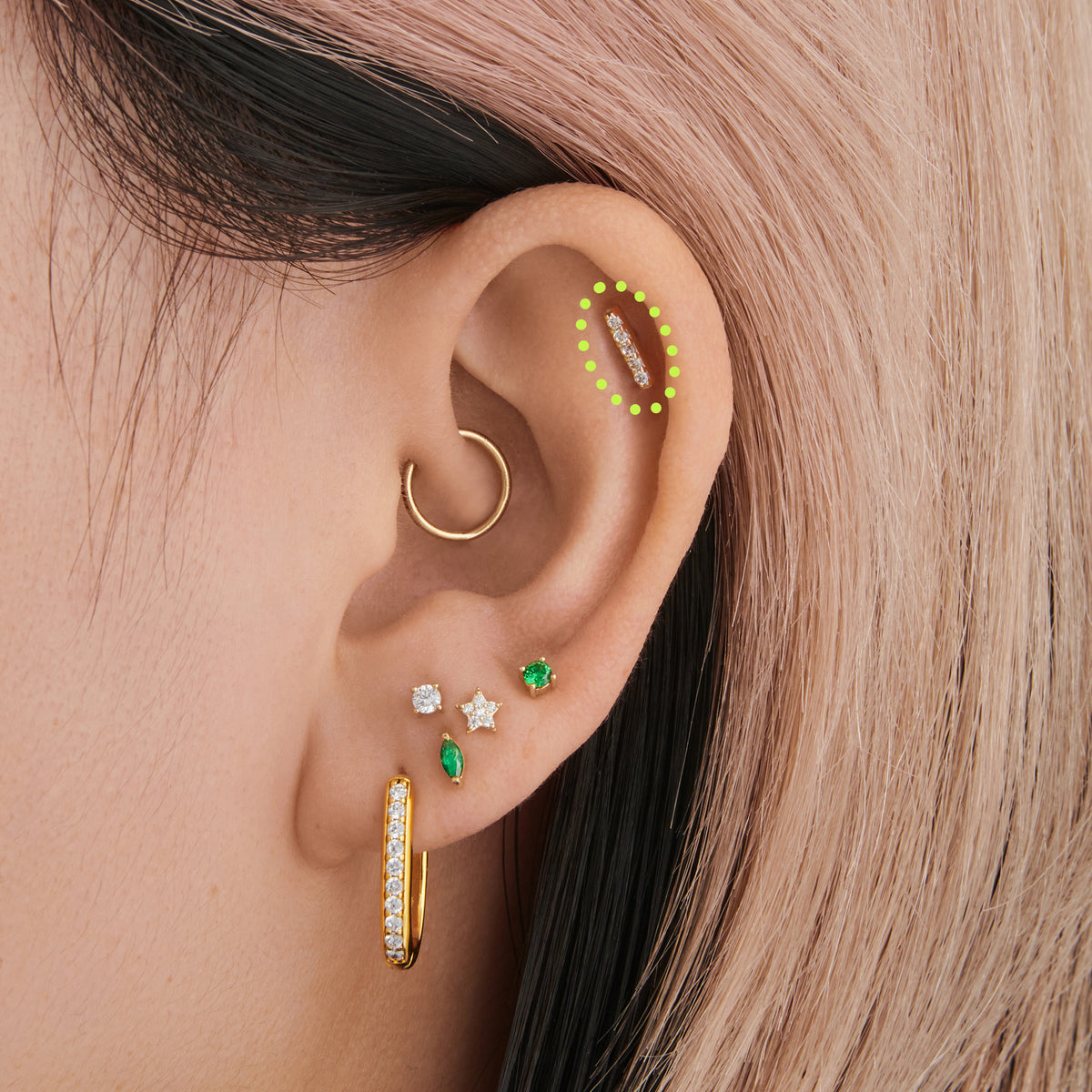 This images shows an Earscape with the 14k Yellow gold pave flatback with five CZ stones 