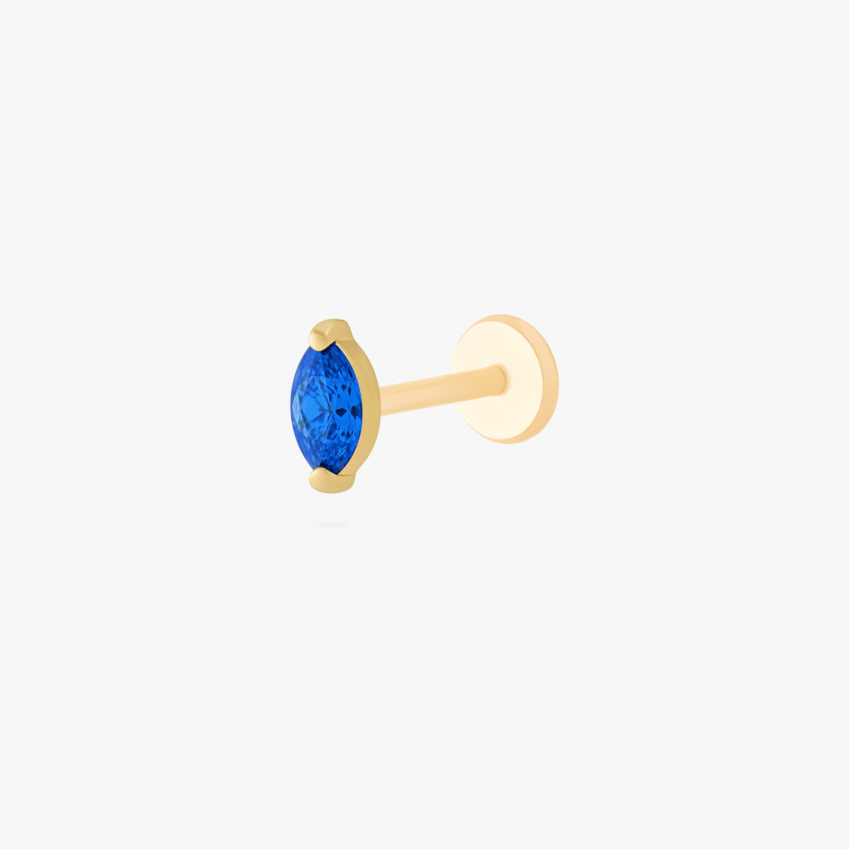 This image shows a side view of a golden titanium marquise flatback with a blue cz stone 