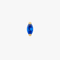This image shows a front view of a golden titanium marquise flatback with a blue cz stone 