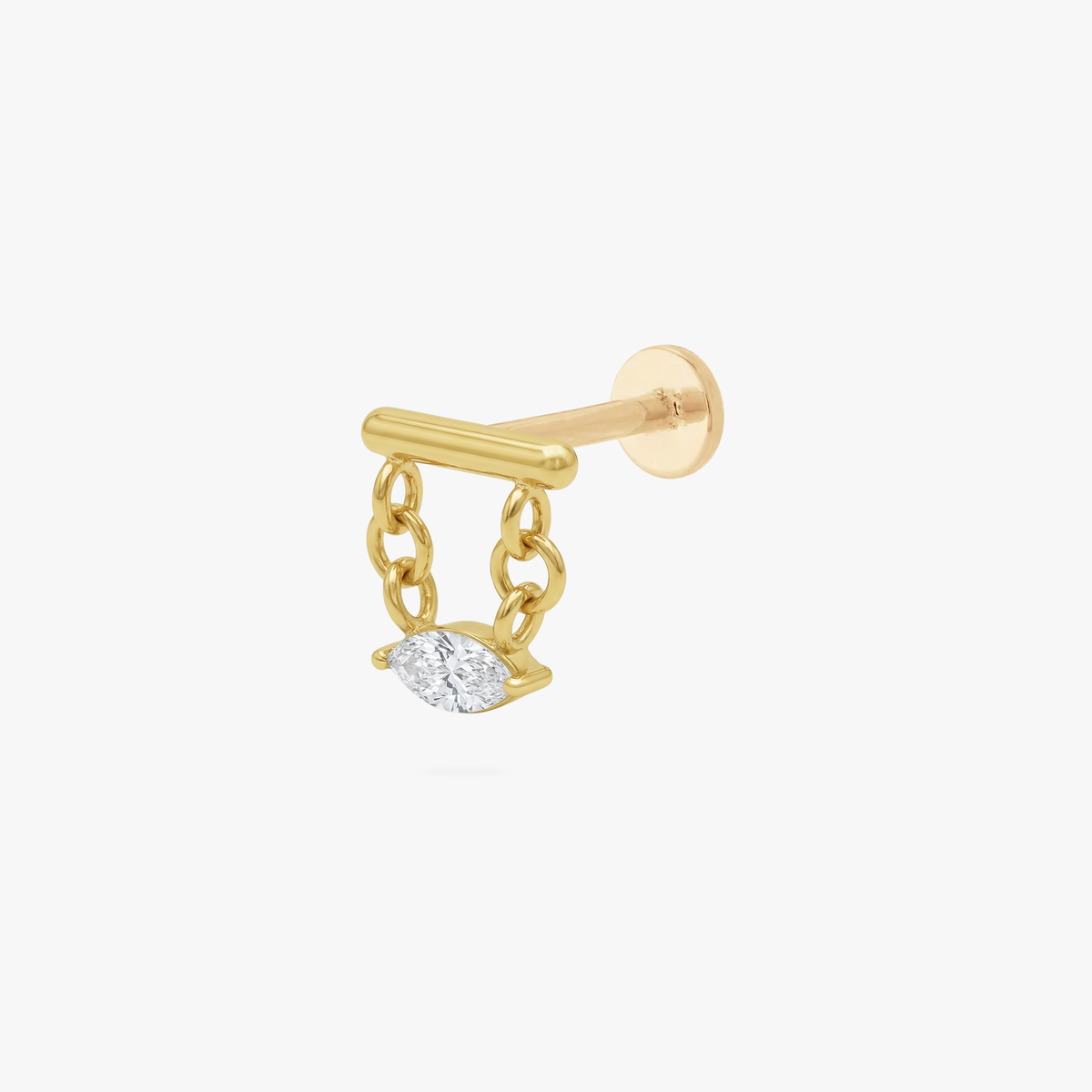 This is an image of a gold toned flatback stud that has a gold bar with chains hanging from both sides supporting a clear, marquise cut CZ stone.  