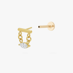 This is an image of a gold toned flatback stud that has a gold bar with chains hanging from both sides supporting a clear, marquise cut CZ stone.  