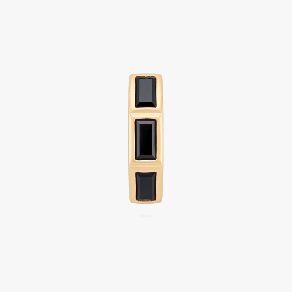 this image shows the front view of the 14k gold plated max bezel baguette huggie with black cz baguette stones. 