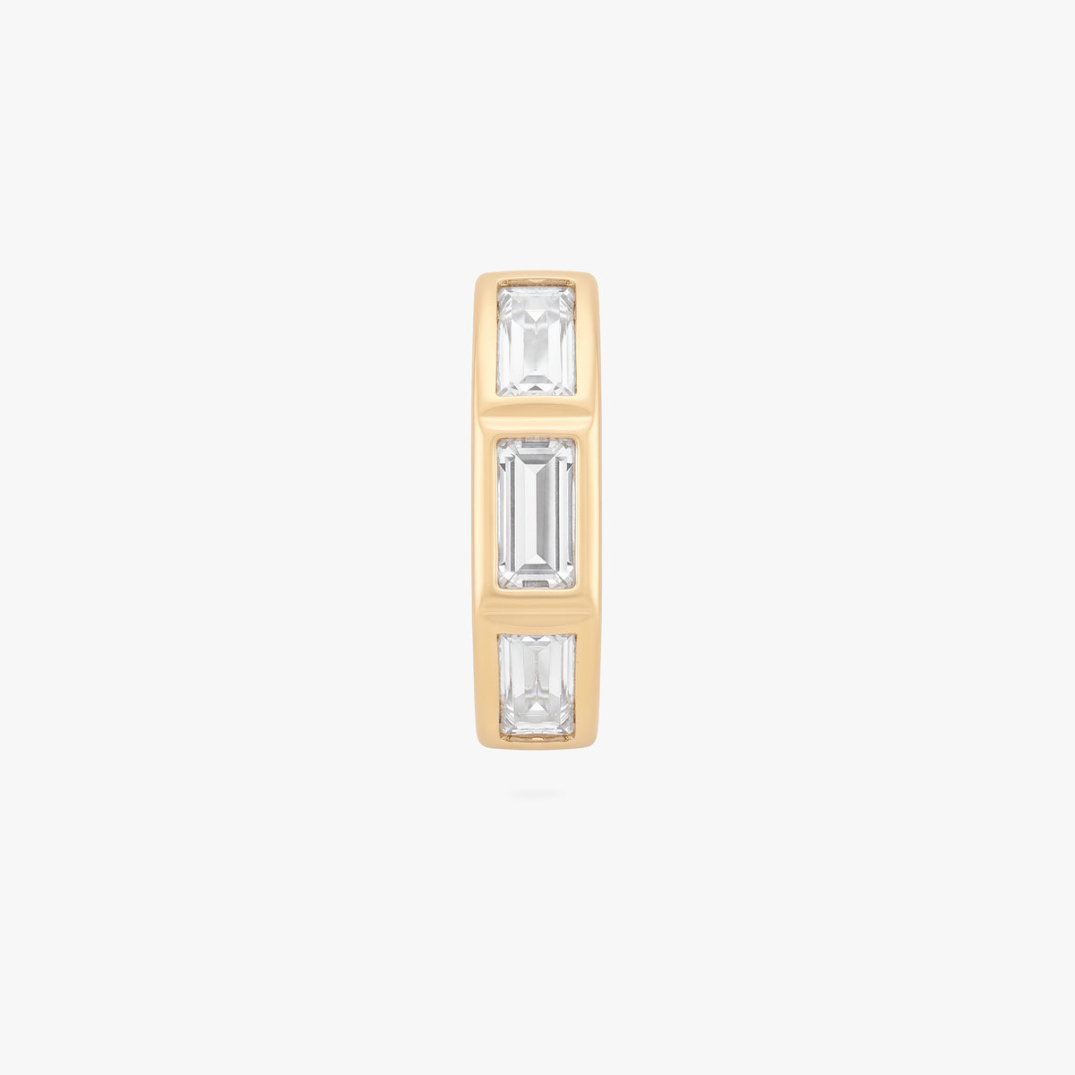 this image shows the front view of the 14k gold plated max bezel baguette huggie with clear cz baguette stones. 