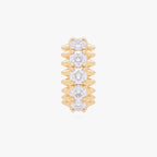 this image shows the front view of the 14k gold plated max pave spike huggie. this huggie has clear cz stones and gold spikes up and down the sides 