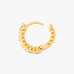 this image shows the open side view of the 14k gold plated max pave spike huggie. this huggie has clear cz stones and gold spikes up and down the sides 