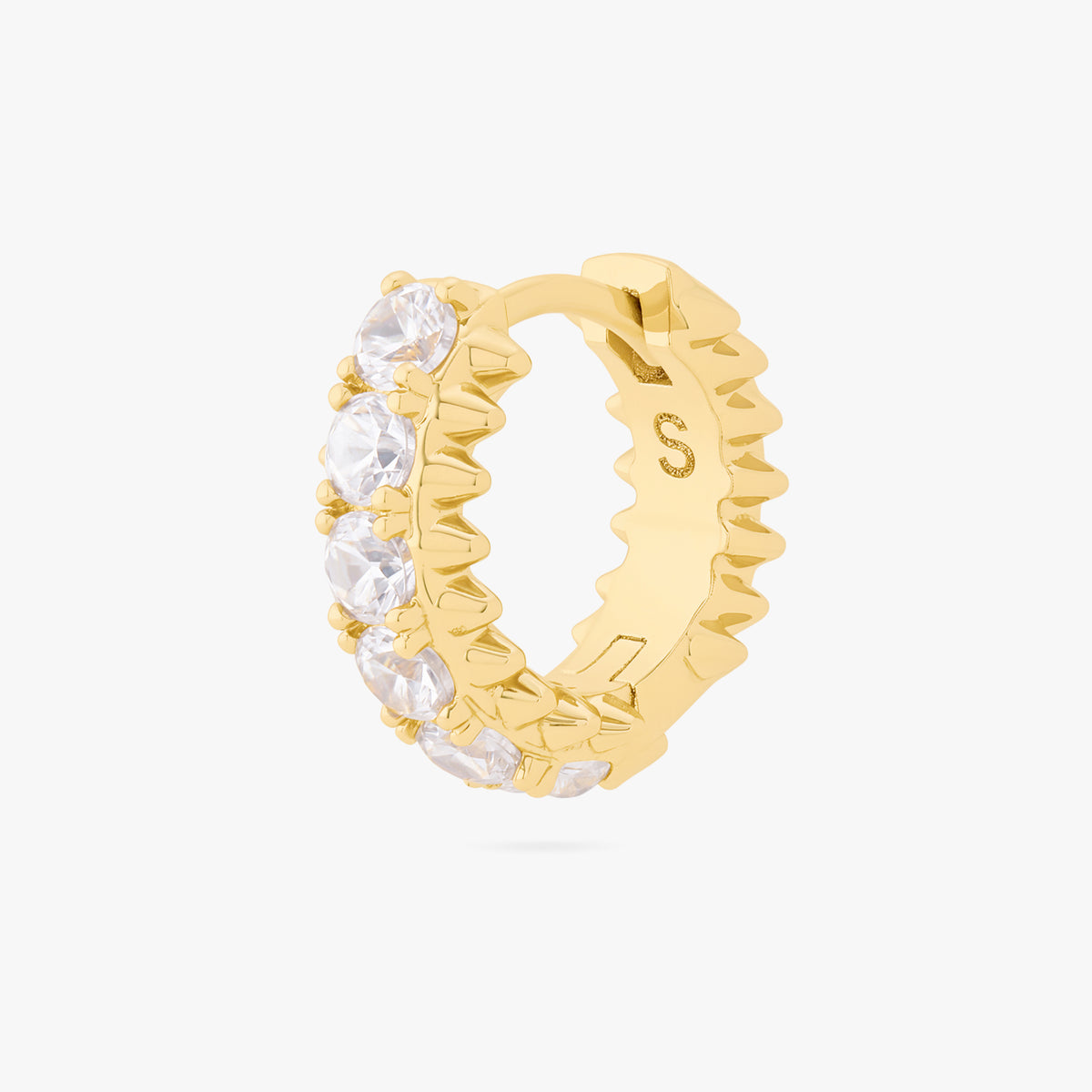 this image shows the side view of the 14k gold plated max pave spike huggie. this huggie has clear cz stones and gold spikes up and down the sides 