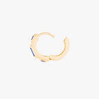 this image shows the side view of a 14k gold plated huggie with three blue circular cz stones disconnected from hinge 