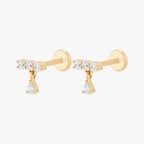 This image shows an image of a pair side view of the 14k Yellow gold pave bar flatback with cz dangle.