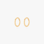 This is an image of a pair of gold clickers with 6mm inner diameters. [pair] color:null|gold