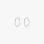 This is an image of a pair of silver clickers with 6mm inner diameters. [pair] color:null|silver