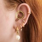 This is an image of a gold clicker with an 8mm inner diameter. [hover] color:null|gold