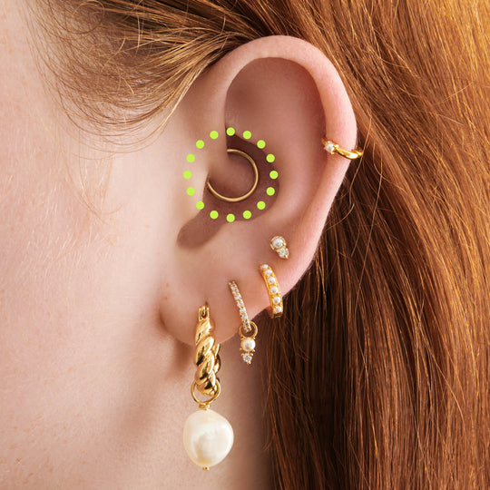 This is an image of a gold clicker with an 8mm inner diameter. [hover] color:null|gold