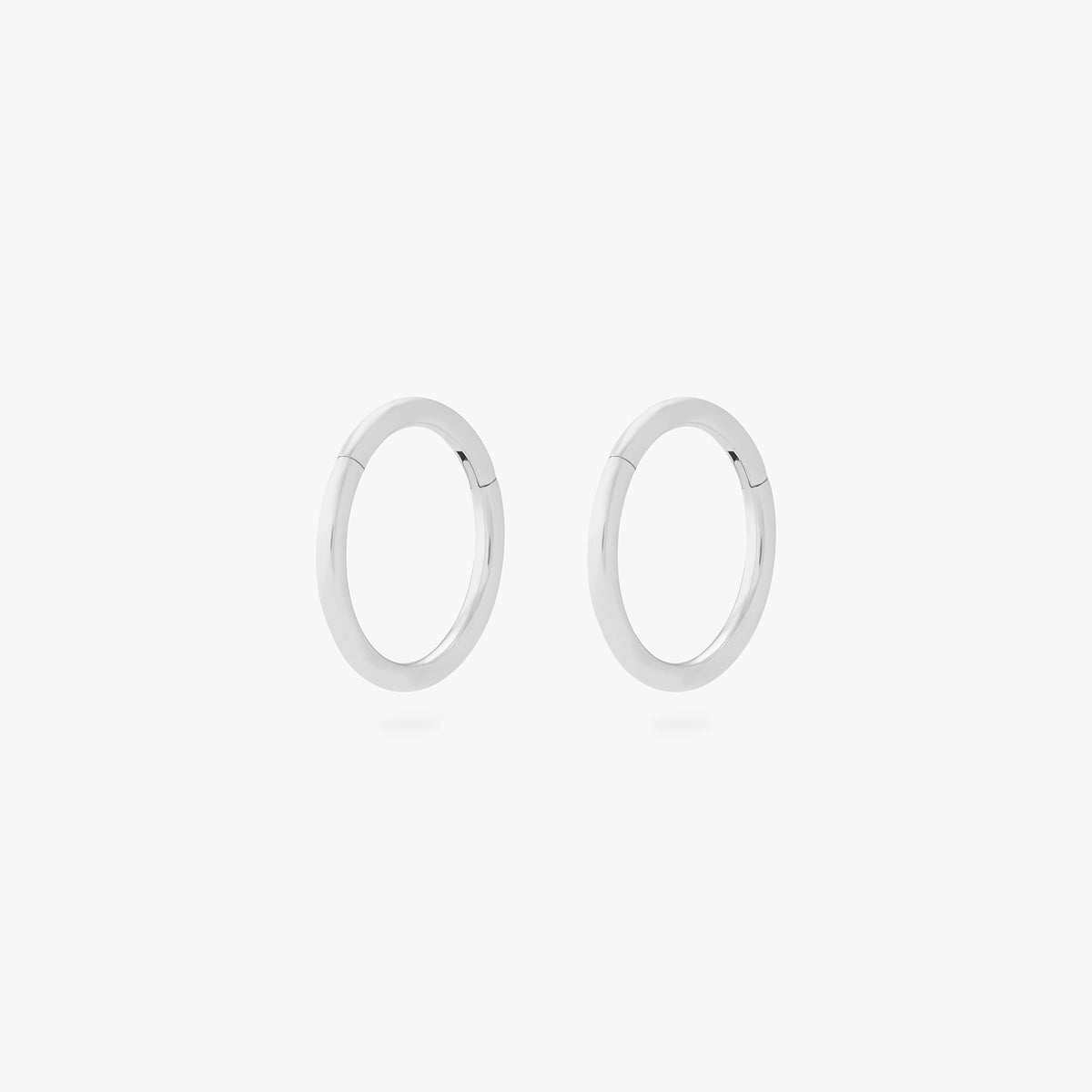 This is an image of a pair of silver clickers with 8mm inner diameters. [pair] color:null|silver