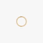 This is an image of a 14K gold clicker that is 8mm wide against a white background.