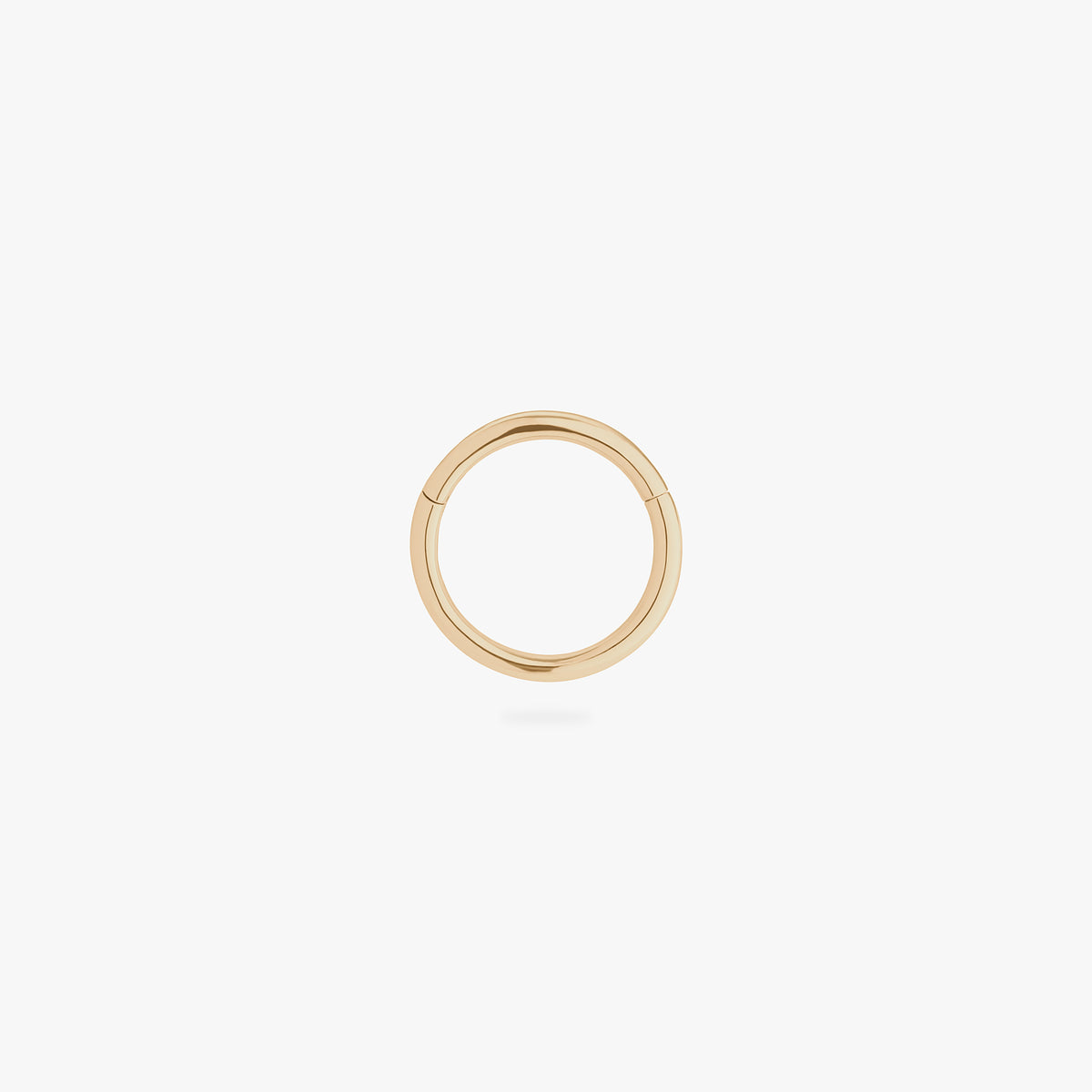 This is an image of a 14K gold clicker that is 8mm wide against a white background.