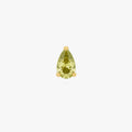 this image shows a front view of a Golden Titanium pear flatback with a green cz stone. 