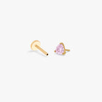 this image shows the side view of a Golden Titanium pear flatback with a pink cz stone separated from labret