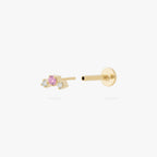 this image shows a gold plated micro cluster flatbacks with two clear and one pink cz stones separated from labret