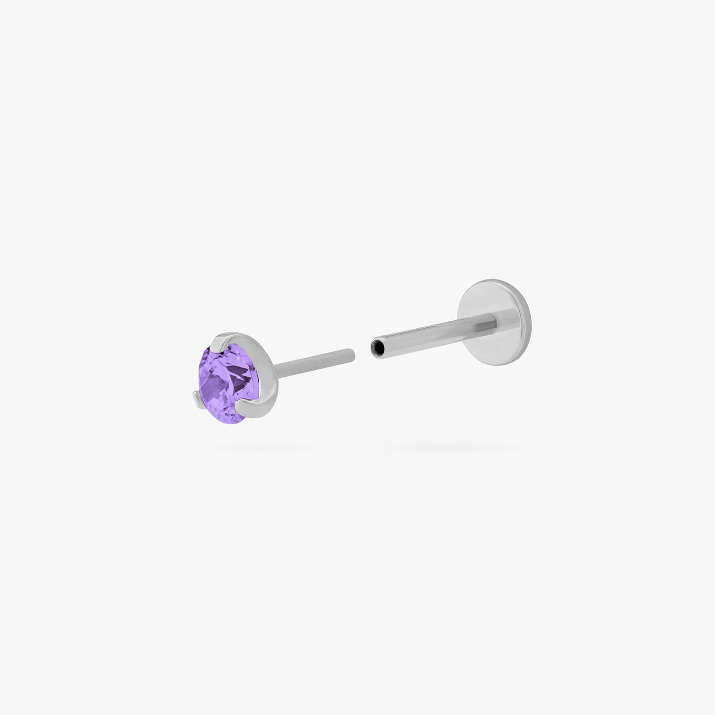 This is a silver toned titanium flatback stud with an amethyst mini cz stone. color:null|amethyst