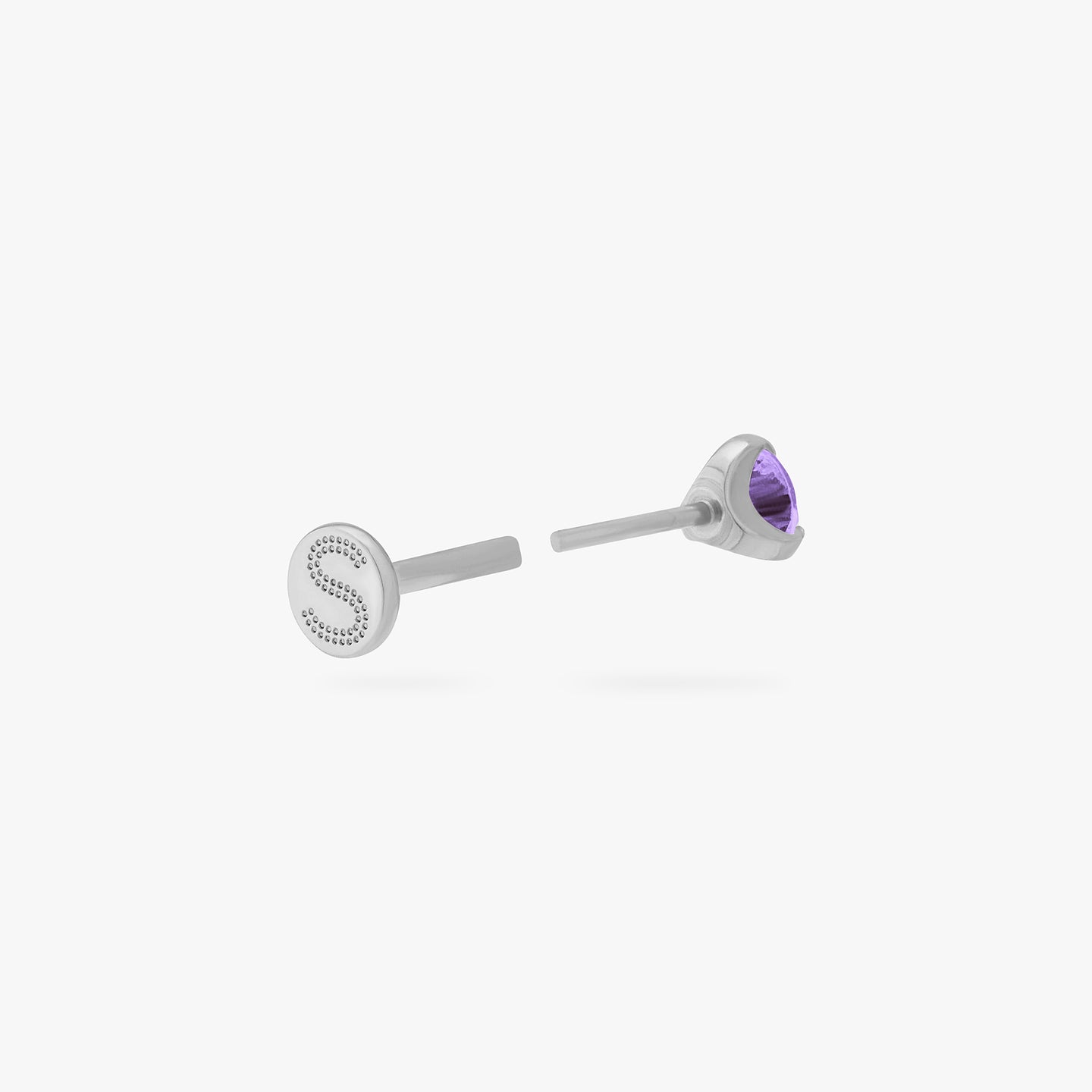 This is a silver toned titanium flatback stud with an amethyst mini cz stone. color:null|amethyst