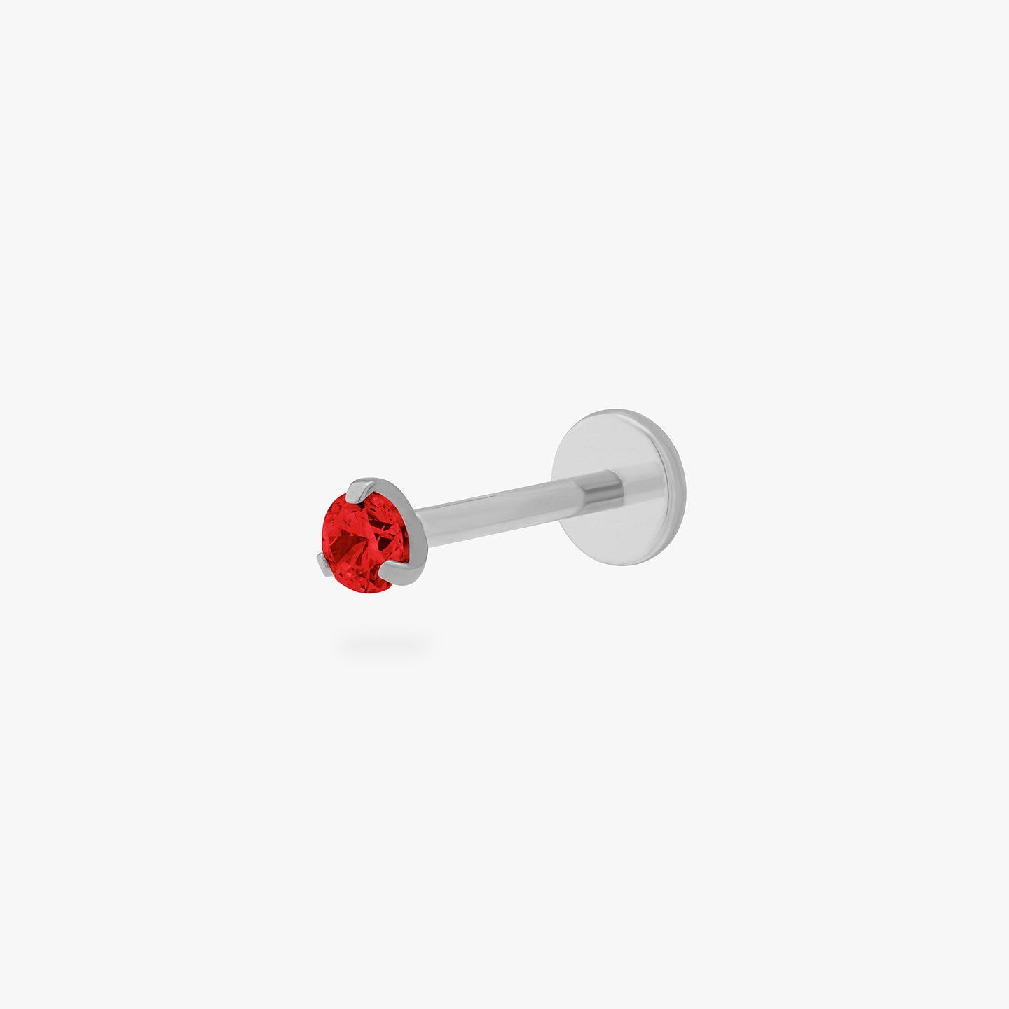 This is a silver toned titanium flatback stud with a garnet mini cz stone. color:null|garnet