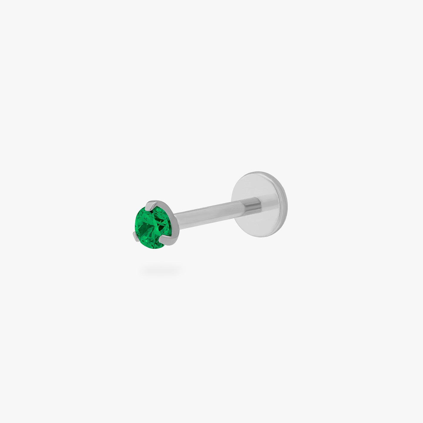 This is a silver toned titanium flatback stud with an emerald mini cz stone. color:null|emerald