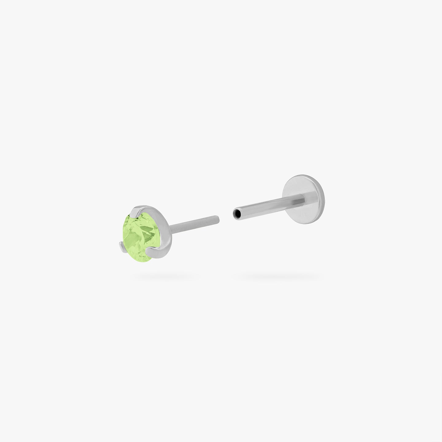 This is a silver toned titanium flatback stud with a mini peridot cz stone. color:null|peridot