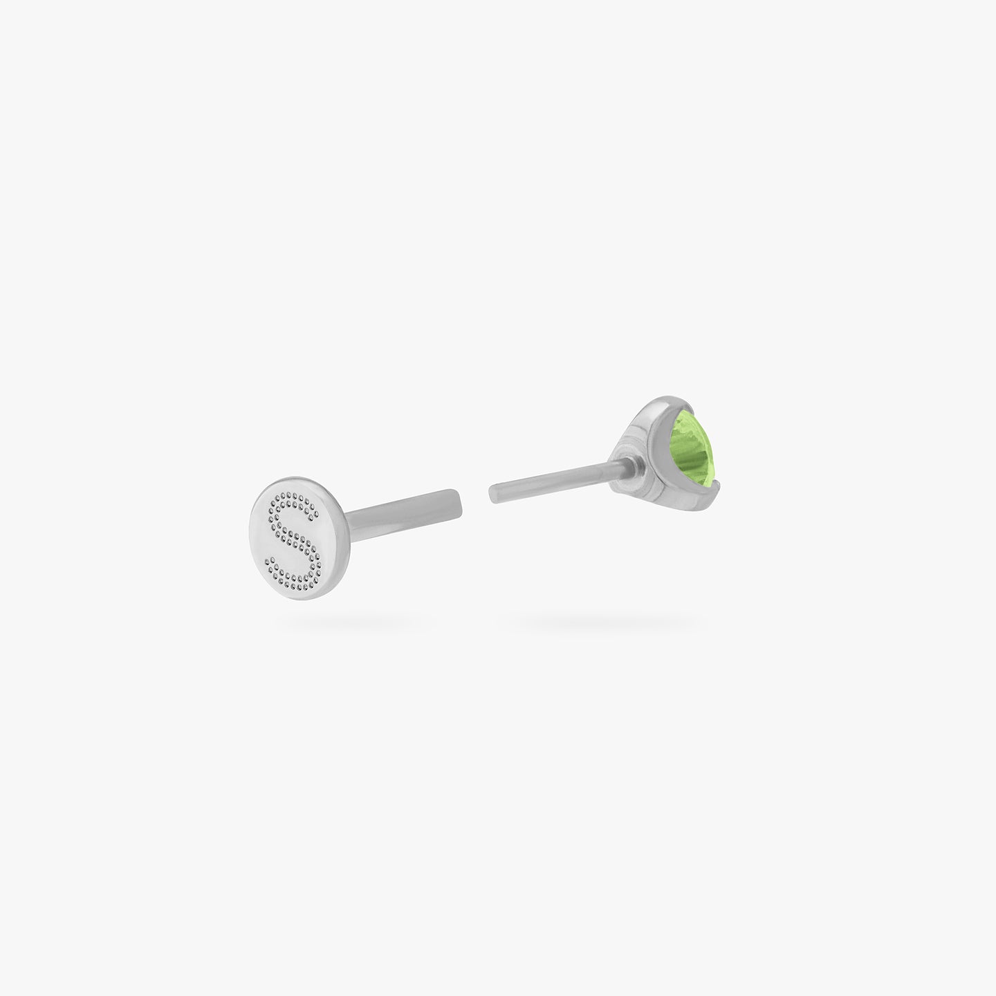 This is a silver toned titanium flatback stud with a mini peridot cz stone. color:null|peridot