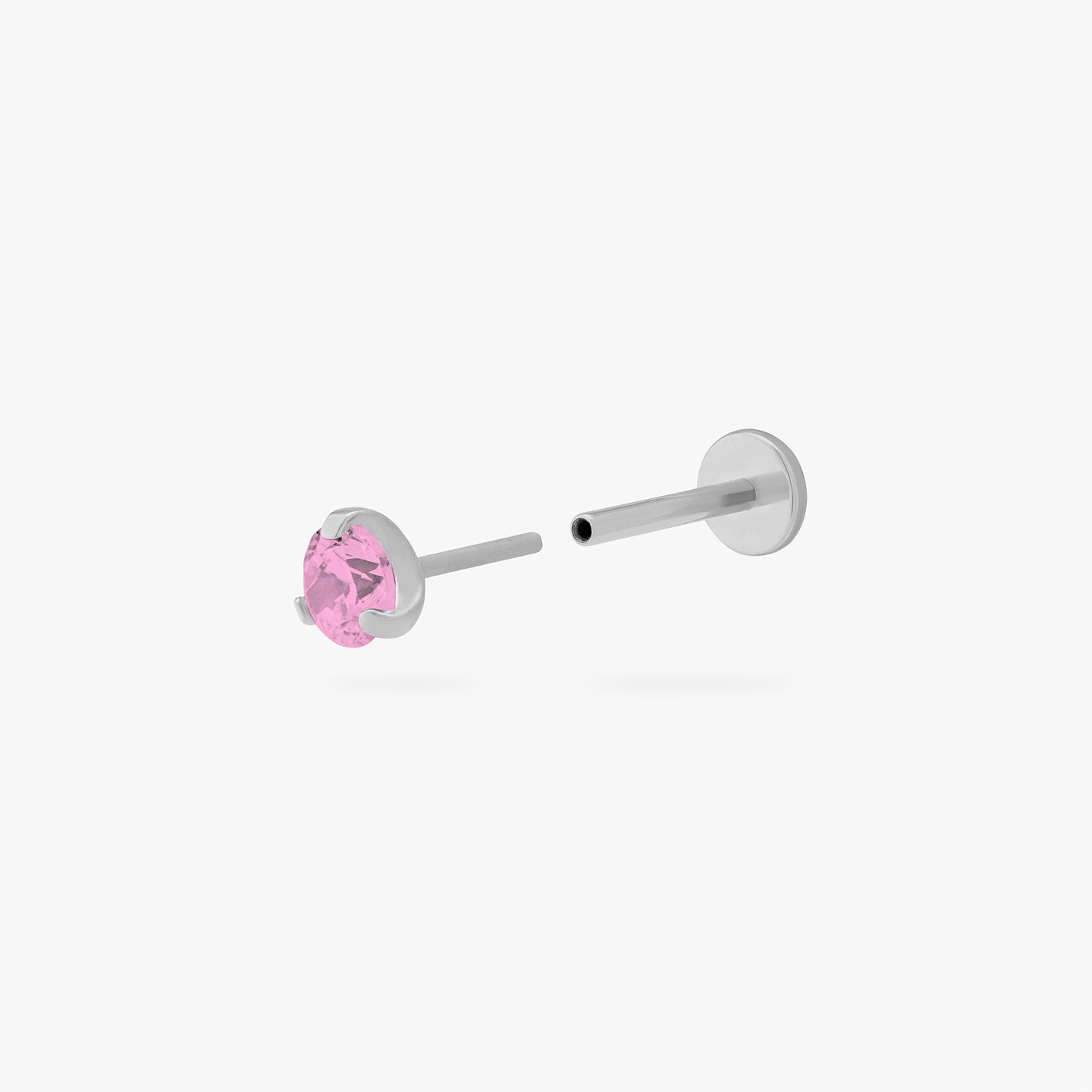 This is a silver toned titanium flatback stud with a mini tourmaline cz stone. color:null|tourmaline