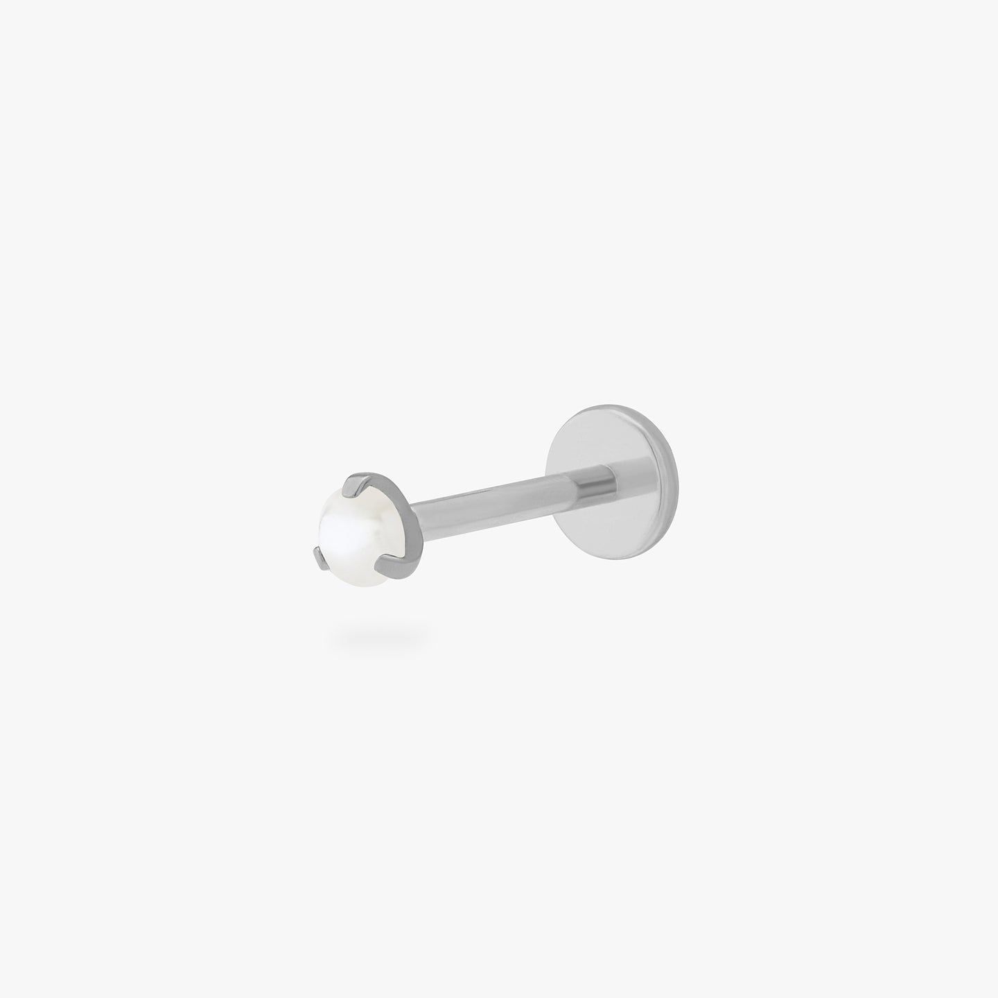 This is a silver toned titanium flatback stud with a mini pearl stone. color:null|pearl