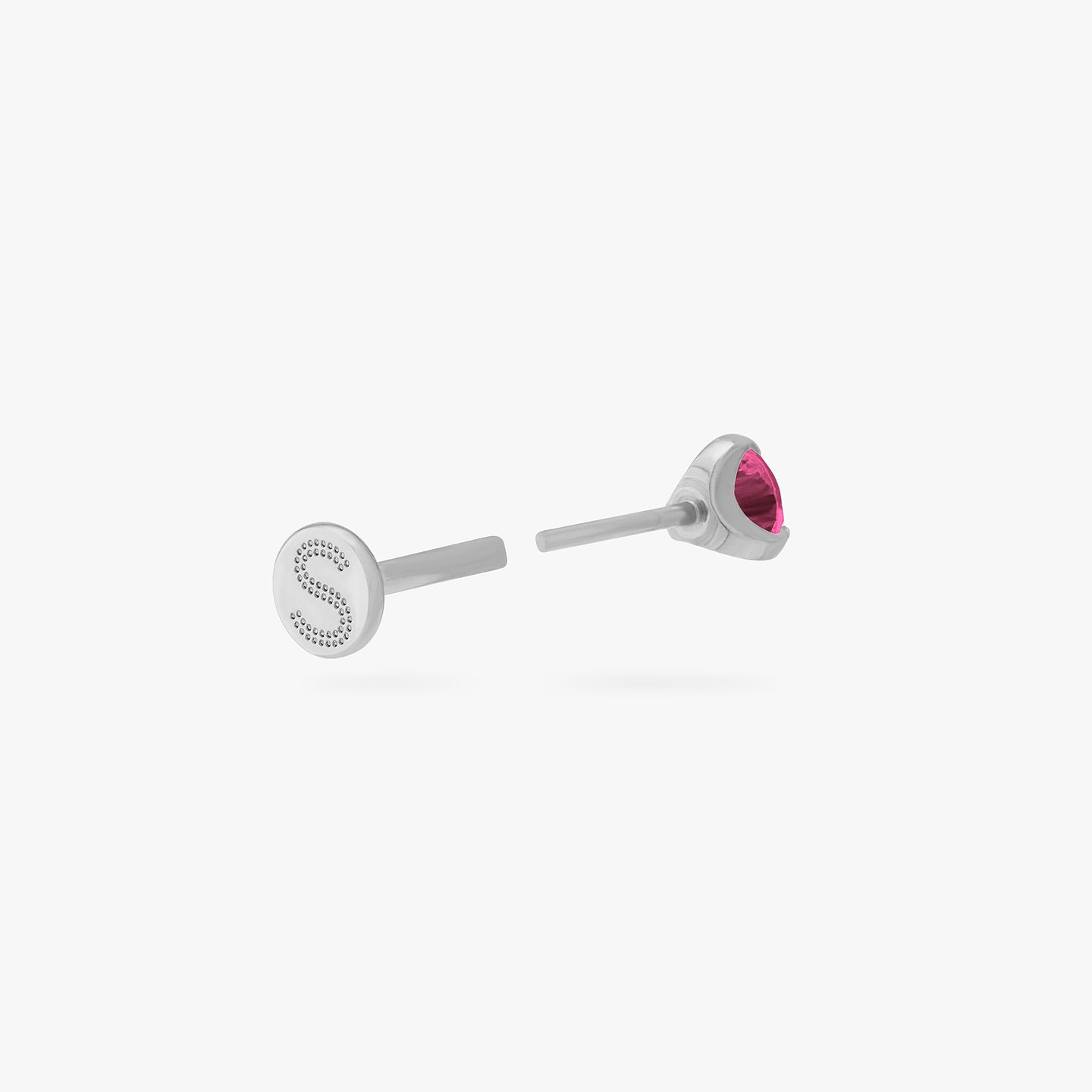 This is a silver toned titanium flatback stud with a mini ruby cz stone. color:null|ruby