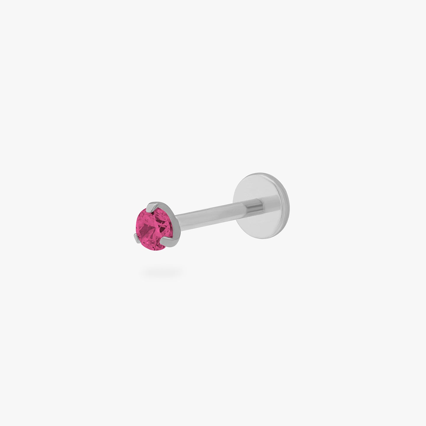 This is a silver toned titanium flatback stud with a mini ruby cz stone. color:null|ruby