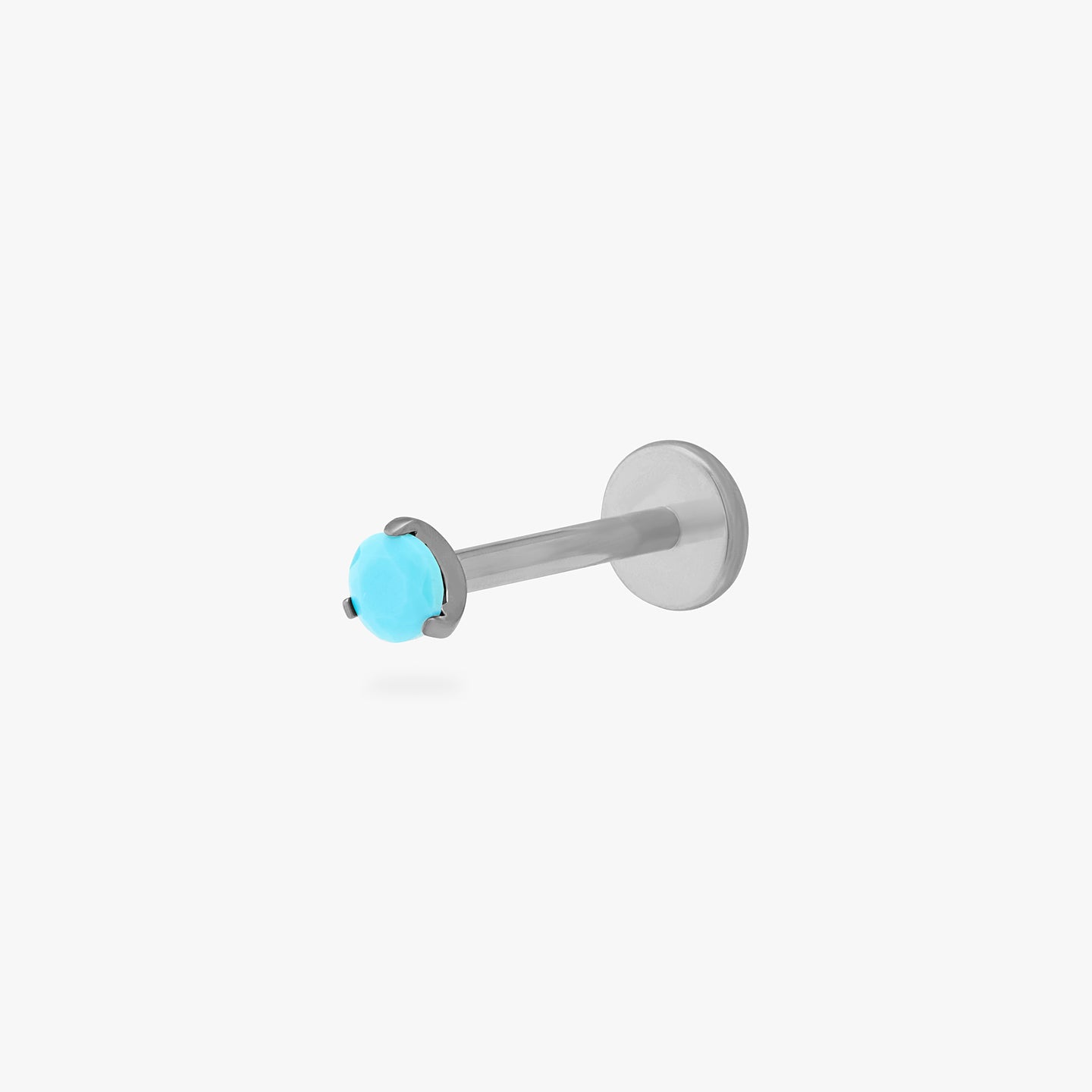 This is a silver toned titanium flatback stud with a mini turquoise cz stone. color:null|turquoise